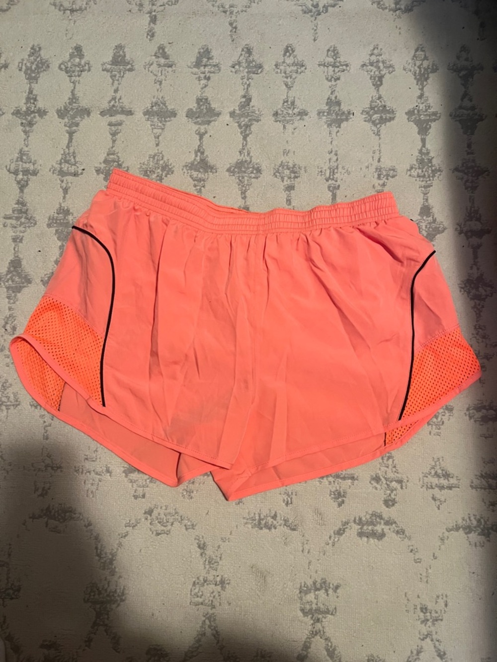 Neon coral Nike DriFit shorts